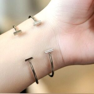 A pair of silver plated light weight bangles, 1 top bar w/rhinestones 🩶🩶